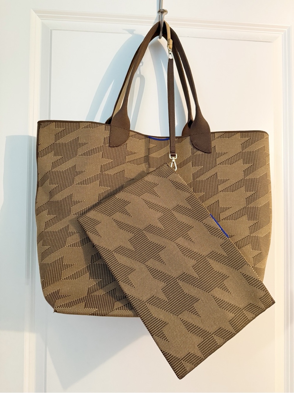Rothy’s lightweight tote and matching pouch in “dark camel houndstooth”